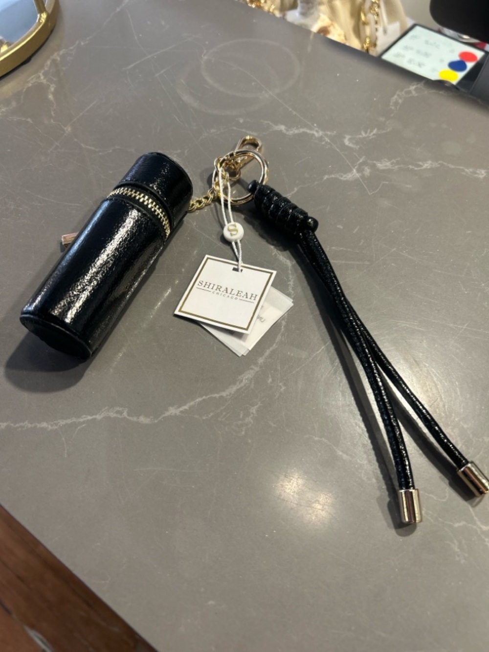 Shiraleah Black Patent Lipstick Case Keychain with Gold Hardware - Picture 9 of 11